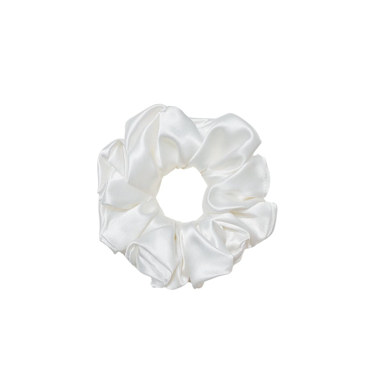White Scrunchie in large size by RedBerry Cuddle. A classic, soft white hair accessory with a plush texture, designed for a secure and stylish hold.