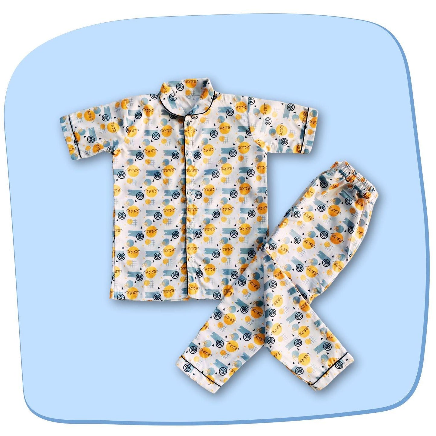 Doodle Pajama Set by RedBerry Cuddle, a unisex night suit for kids made from 100% cotton. The set is adorned with playful and creative doodle designs, offering comfort and style for bedtime.