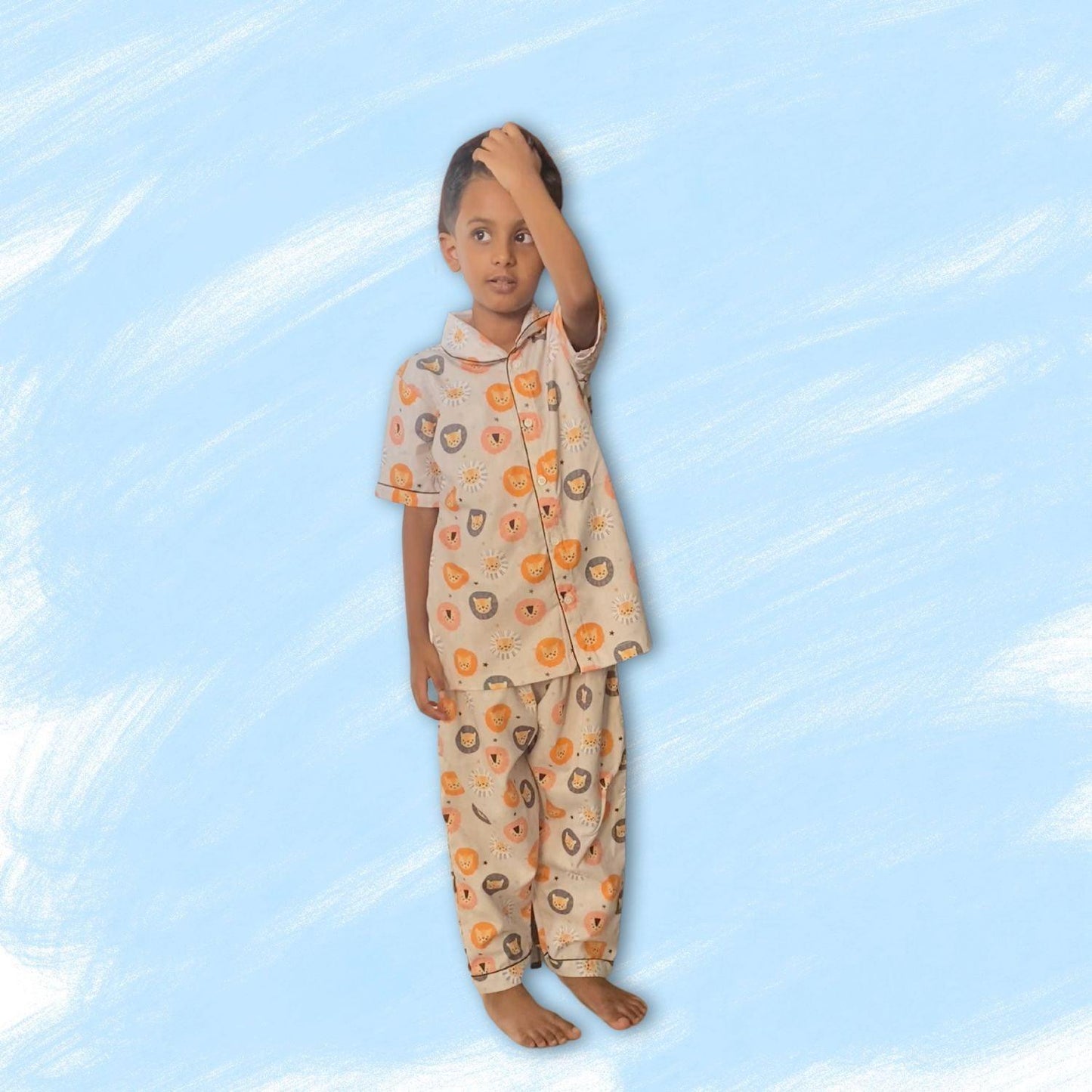 Lion Pajama Set by RedBerry Cuddle, made from 100% cotton. A playful and soft unisex pajama set for kids, featuring a charming lion design, perfect for comfortable sleep and cozy nights.
