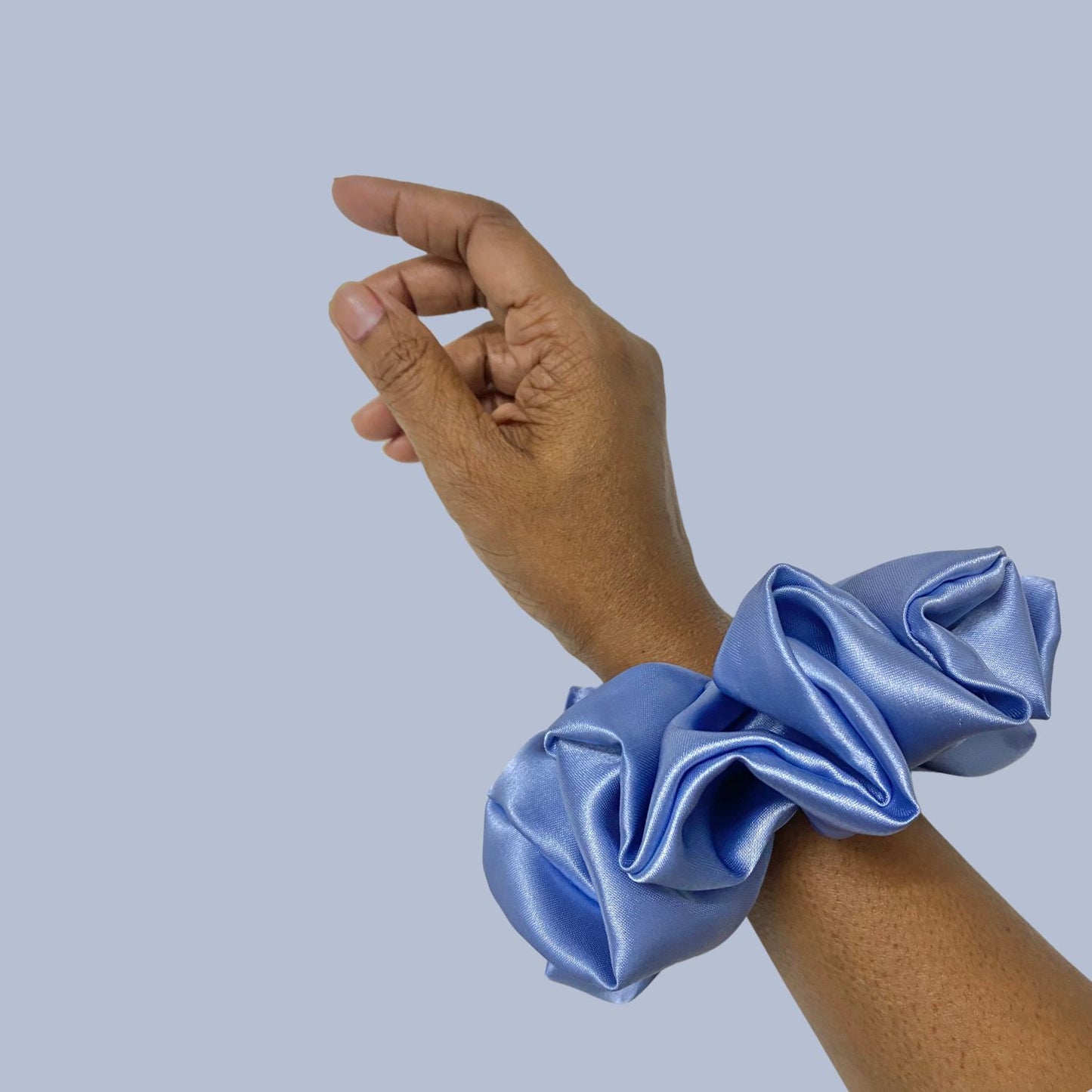 Glaucous Blue Scrunchie in extra-large size by RedBerry Cuddle. A soft, muted blue hair accessory with a plush texture, perfect for a voluminous and secure hold.