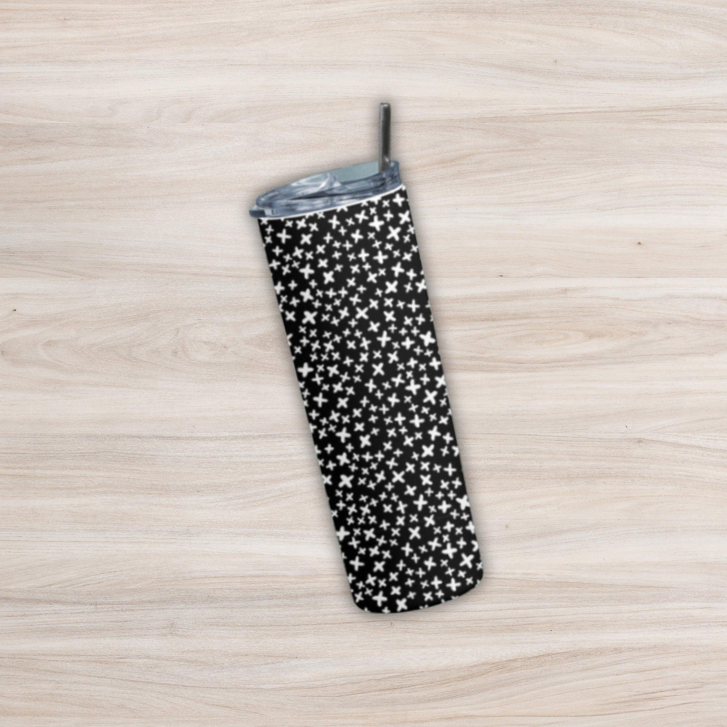 Tiny Star Tumbler Bottle by RedBerry Cuddle, a 20 oz stainless steel tumbler with a metal straw. It features a charming tiny star design, double wall insulation, and a splash-proof lid.