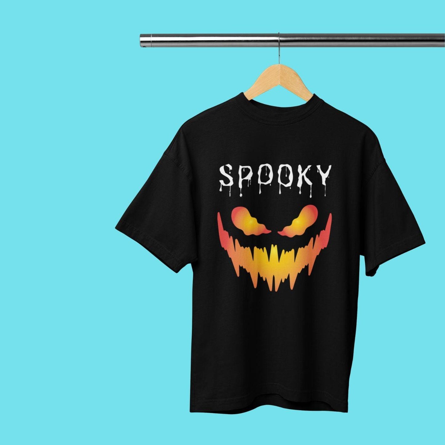 Spooky Men's Oversized T-shirt by RedBerry Cuddle, made from 100% cotton. This glow-in-the-dark shirt features a spooky-themed design, offering a bold and fun look with a relaxed fit for casual wear.