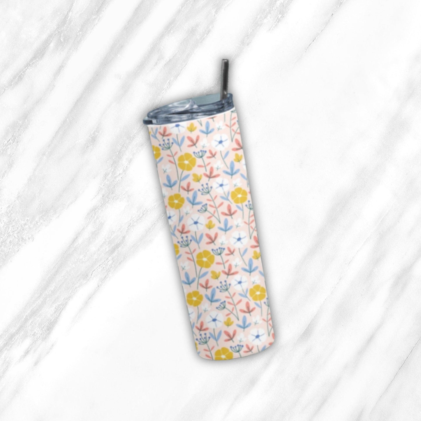 Flower Tumbler Bottle by RedBerry Cuddle, a 20 oz stainless steel tumbler with a metal straw. It features a floral design, double wall insulation, and a splash-proof lid, ideal for keeping beverages hot or cold on the go.