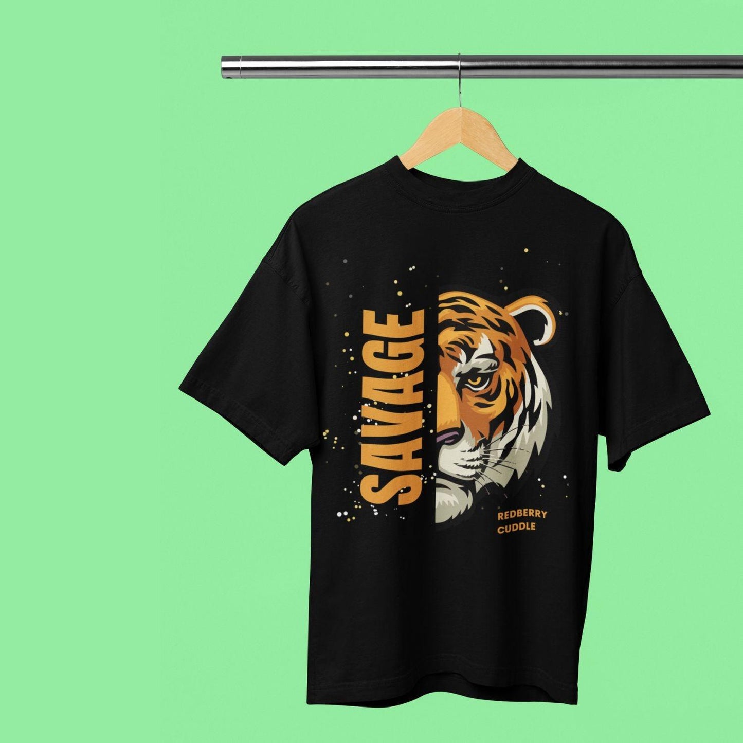 Tiger Savage Men's Oversized T-shirt by RedBerry Cuddle, made from 100% cotton. This shirt features a fierce tiger-themed design with a 'Savage' slogan, offering a relaxed and bold style for casual wear.