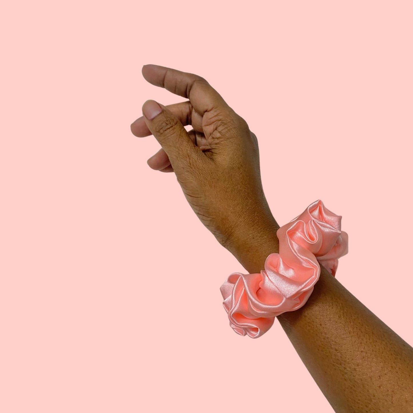 Flamingo Pink Scrunchie in small size by RedBerry Cuddle. A vibrant pink hair accessory with a soft, plush texture, designed for a secure and stylish hold.