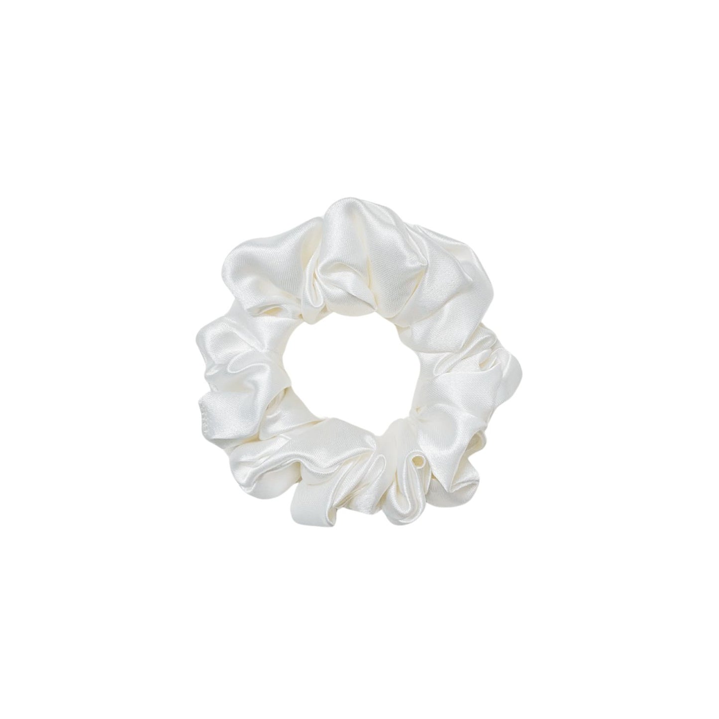 White Scrunchie in small size by RedBerry Cuddle. A classic, soft white hair accessory with a plush texture, designed for a secure and stylish hold.