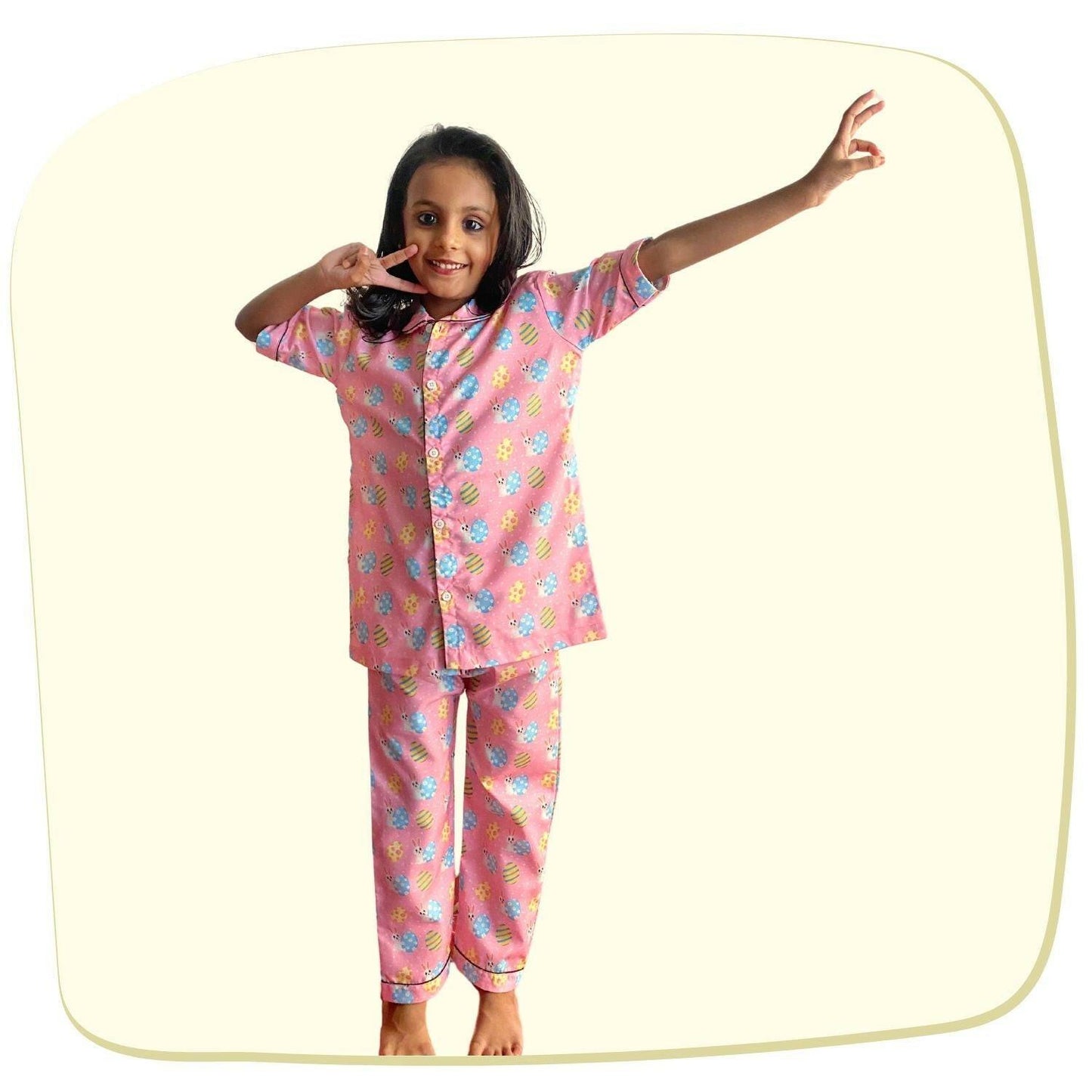 Easter Egg Pink Pajama Set by RedBerry Cuddle, made from 100% cotton. A soft and cozy unisex pajama set in a cheerful pink hue, designed for kids to enjoy comfortable sleep.