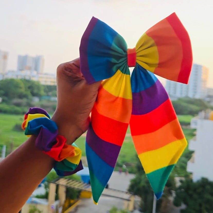 Pride Hair Bows (Pack of 2) by RedBerry Cuddle. A colorful and expressive set of two classic hair bows featuring vibrant rainbow-themed designs, crafted from high-quality fabric to celebrate LGBTQ+ pride with style and flair.