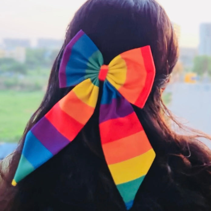 Pride Hair Bows (Pack of 2) by RedBerry Cuddle. A colorful and expressive set of two classic hair bows featuring vibrant rainbow-themed designs, crafted from high-quality fabric to celebrate LGBTQ+ pride with style and flair.