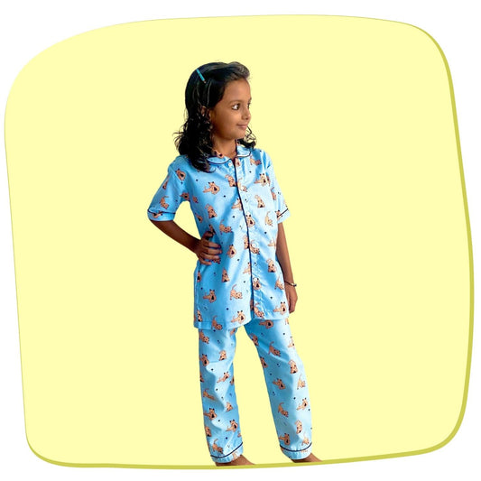 Wild Cat Pajama Set by RedBerry Cuddle, a unisex night suit for kids made from 100% cotton. The set features a playful wild cat print, designed for comfort and style during bedtime.