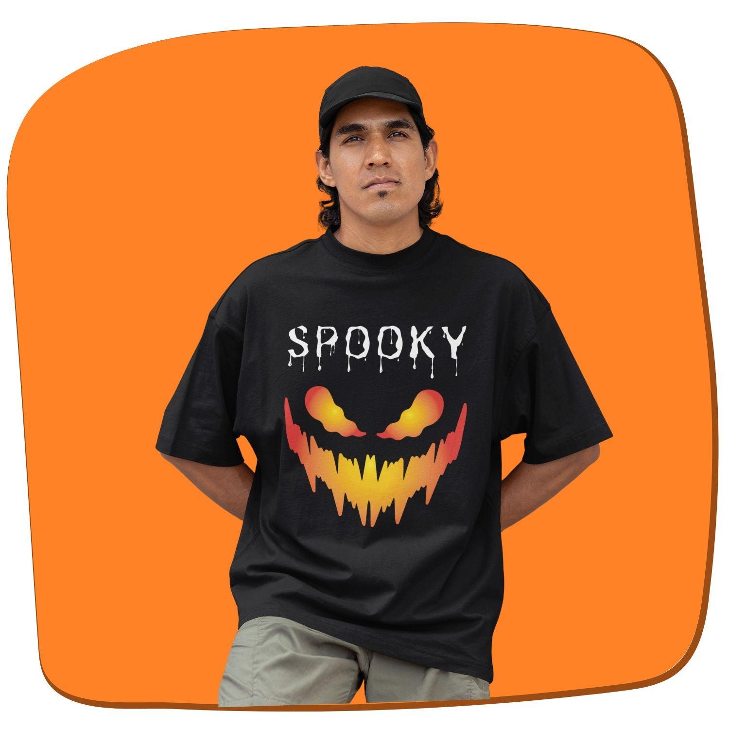 Spooky Men's Oversized T-shirt by RedBerry Cuddle, made from 100% cotton. This glow-in-the-dark shirt features a spooky-themed design, offering a bold and fun look with a relaxed fit for casual wear.