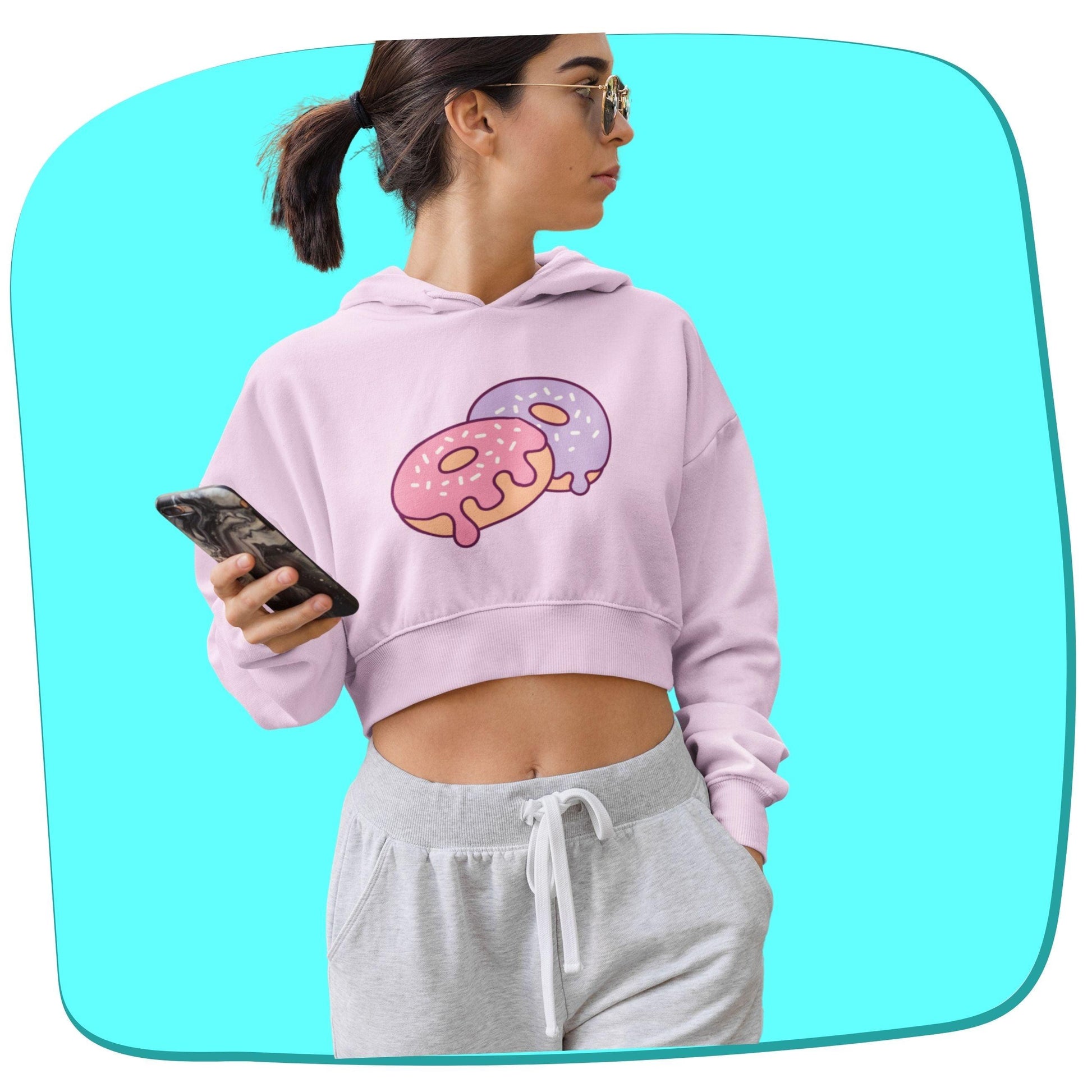 Donuts Women's Crop Hoodie by RedBerry Cuddle, featuring a fun donut-themed design. This stylish hoodie combines comfort and playful charm, perfect for casual wear.