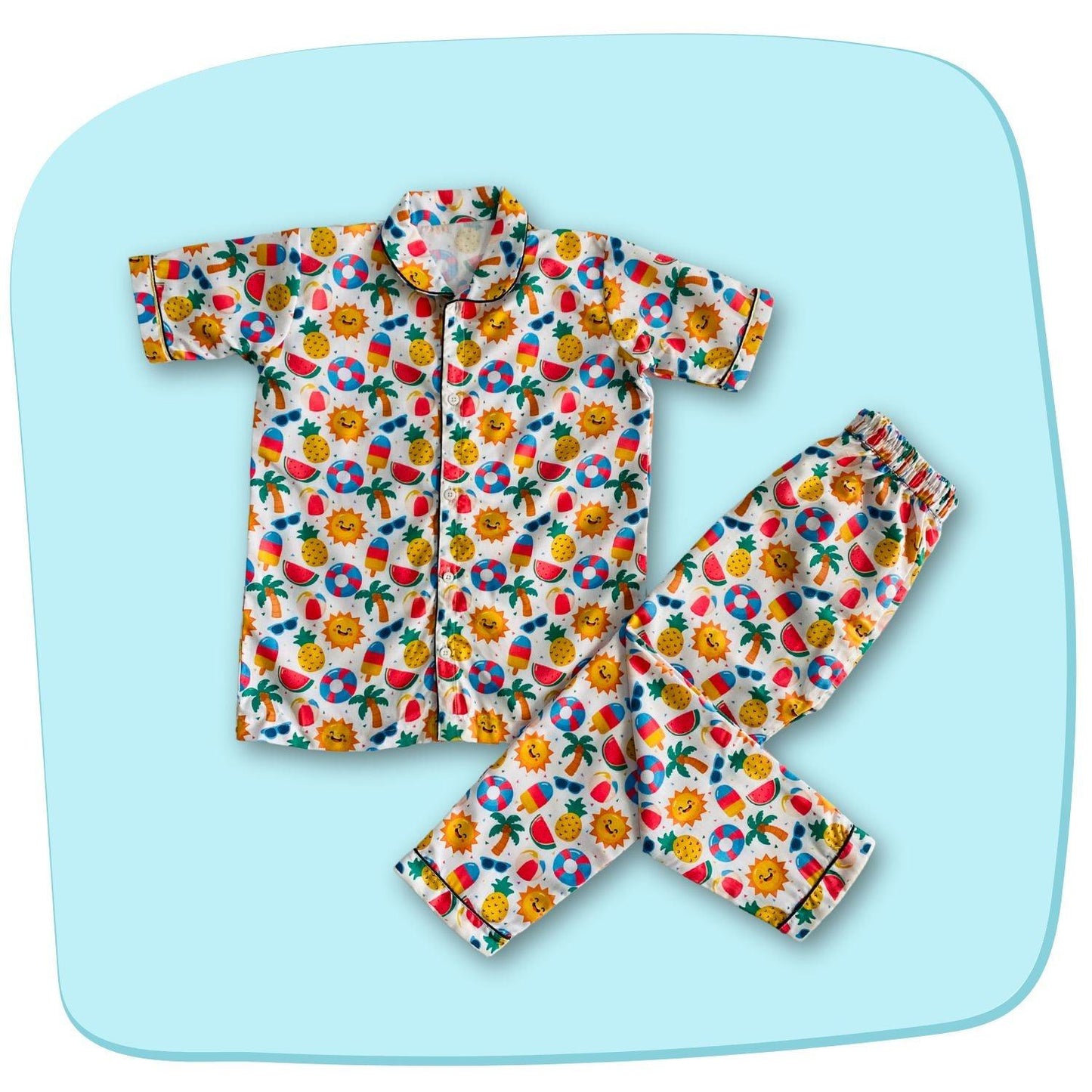 Sunny Beach Doodle Pajama Set by RedBerry Cuddle, made from 100% cotton. A soft and cheerful unisex pajama set for kids, featuring fun beach-themed doodles, perfect for comfortable and playful sleep.