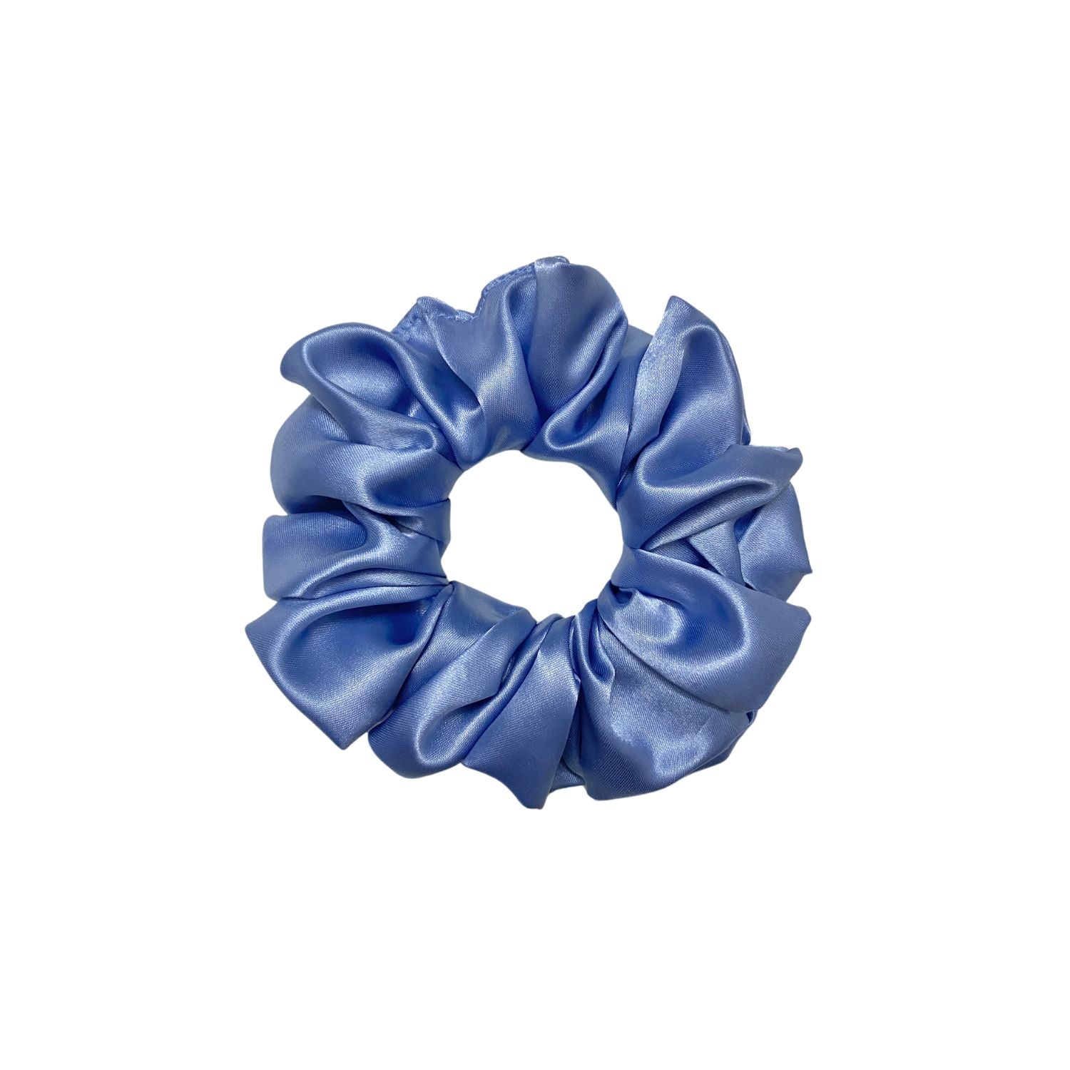Glaucous Blue Scrunchie in large size by RedBerry Cuddle. A soft, muted blue hair accessory with a plush texture, designed for a secure and stylish hold.