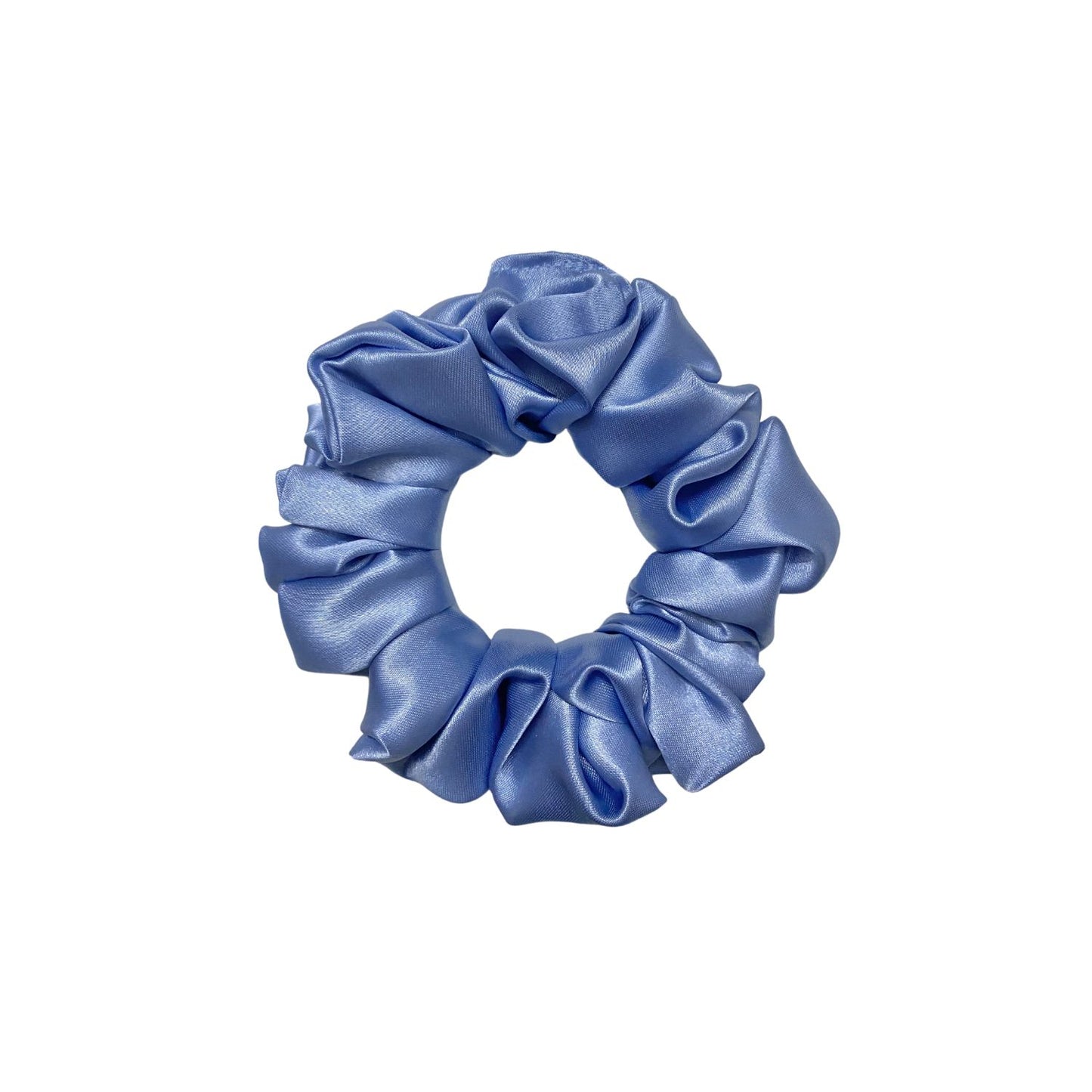 Glaucous Blue Scrunchie in medium size by RedBerry Cuddle. A soft, muted blue hair accessory with a plush texture, offering a secure and comfortable hold.