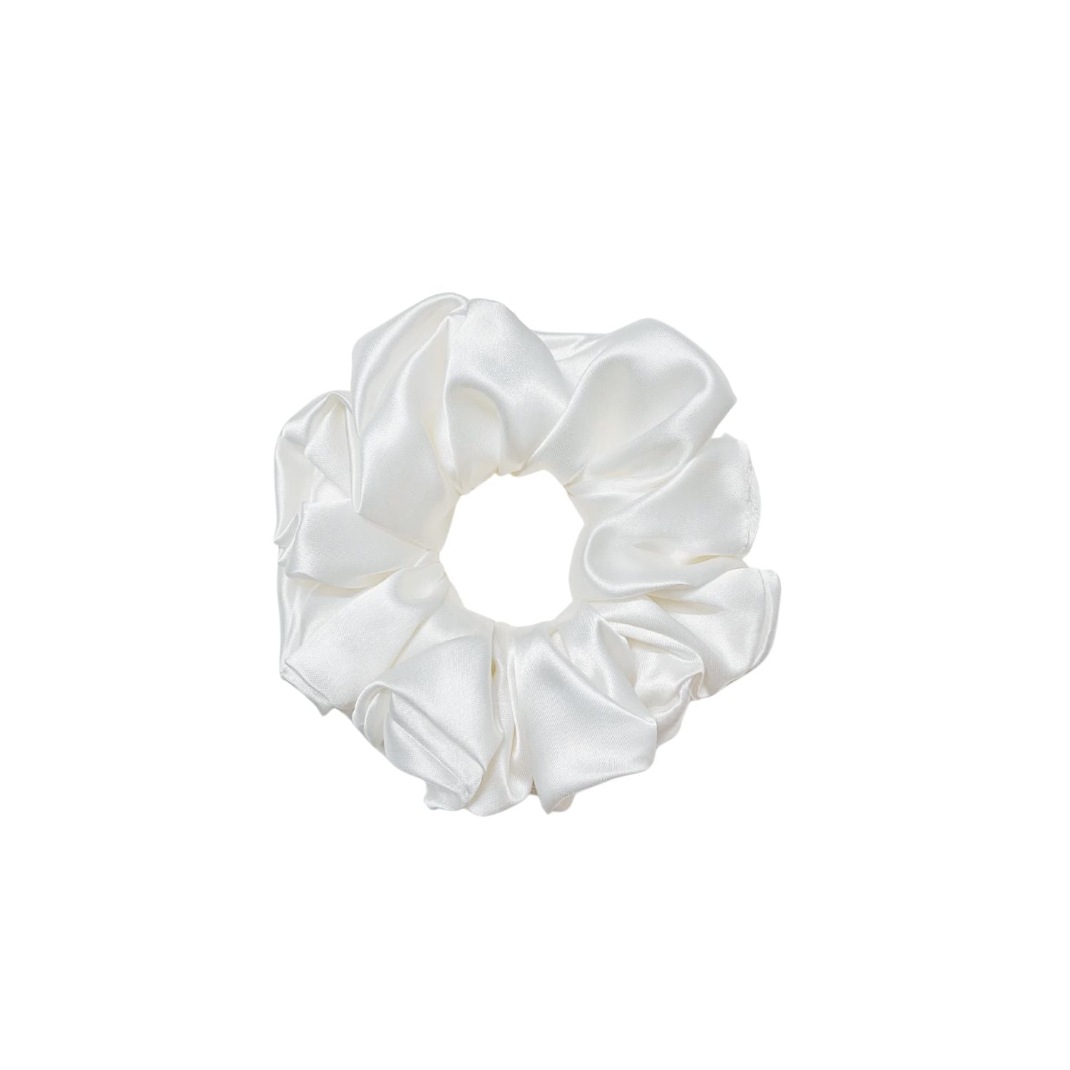 White Scrunchie in large size by RedBerry Cuddle. A classic, soft white hair accessory with a plush texture, designed for a secure and stylish hold.