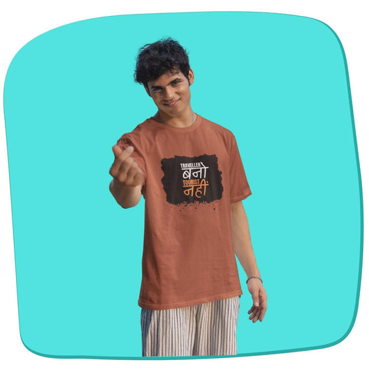 Traveller Bano Tourist Nahi Men's T-shirt by RedBerry Cuddle, made from 100% cotton. It features a bold travel-themed slogan, offering comfort with an adventurous spirit."