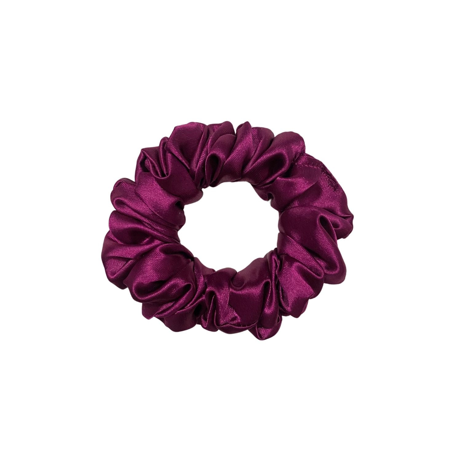 Imperial Purple Scrunchie in small size, made by RedBerry Cuddle. The scrunchie is a rich, deep purple color with a soft, plush texture, designed to add a stylish and comfortable touch to any hairstyle.