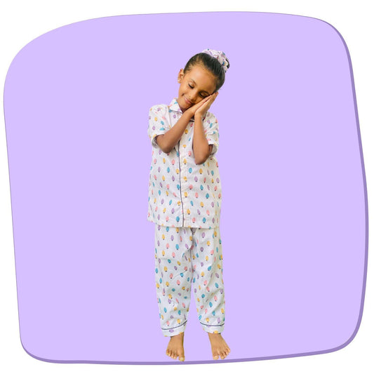 Strawberry Pajama Set by RedBerry Cuddle, made from 100% cotton. A soft and cozy unisex pajama set for kids, featuring a playful strawberry pattern, perfect for comfortable and fun sleep.