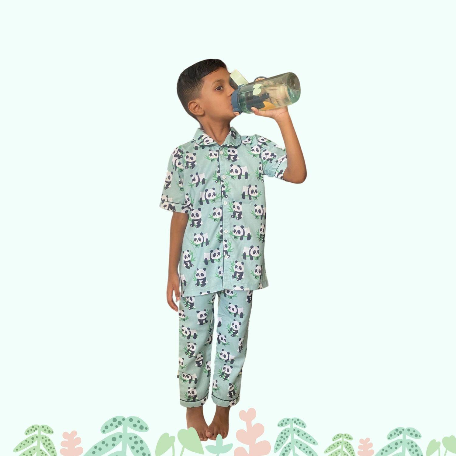 Panda Pajama Set by RedBerry Cuddle, a unisex night suit for kids made from 100% cotton. The set features adorable panda prints, providing a cozy and fun option for bedtime.