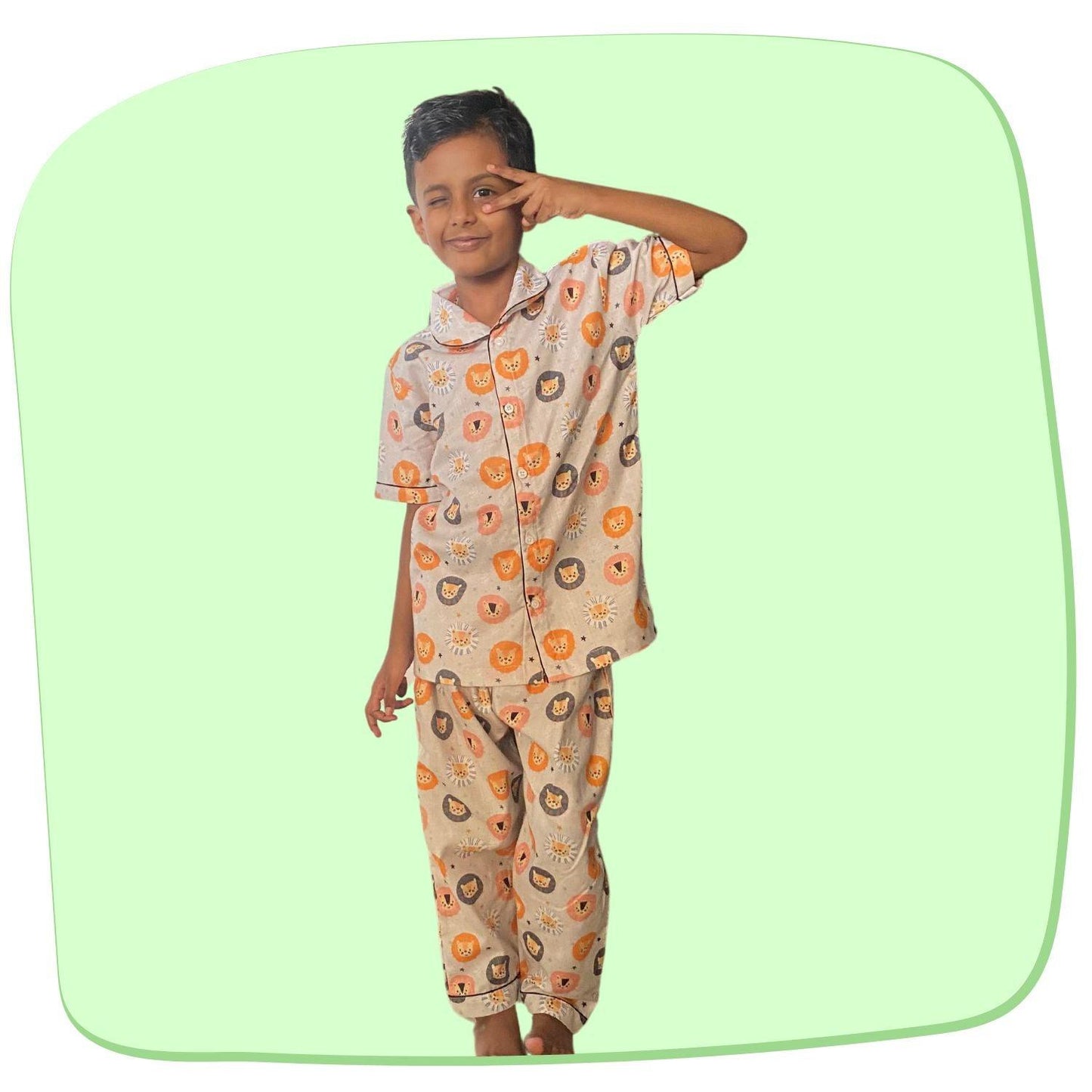 Lion Pajama Set by RedBerry Cuddle, made from 100% cotton. A playful and soft unisex pajama set for kids, featuring a charming lion design, perfect for comfortable sleep and cozy nights.