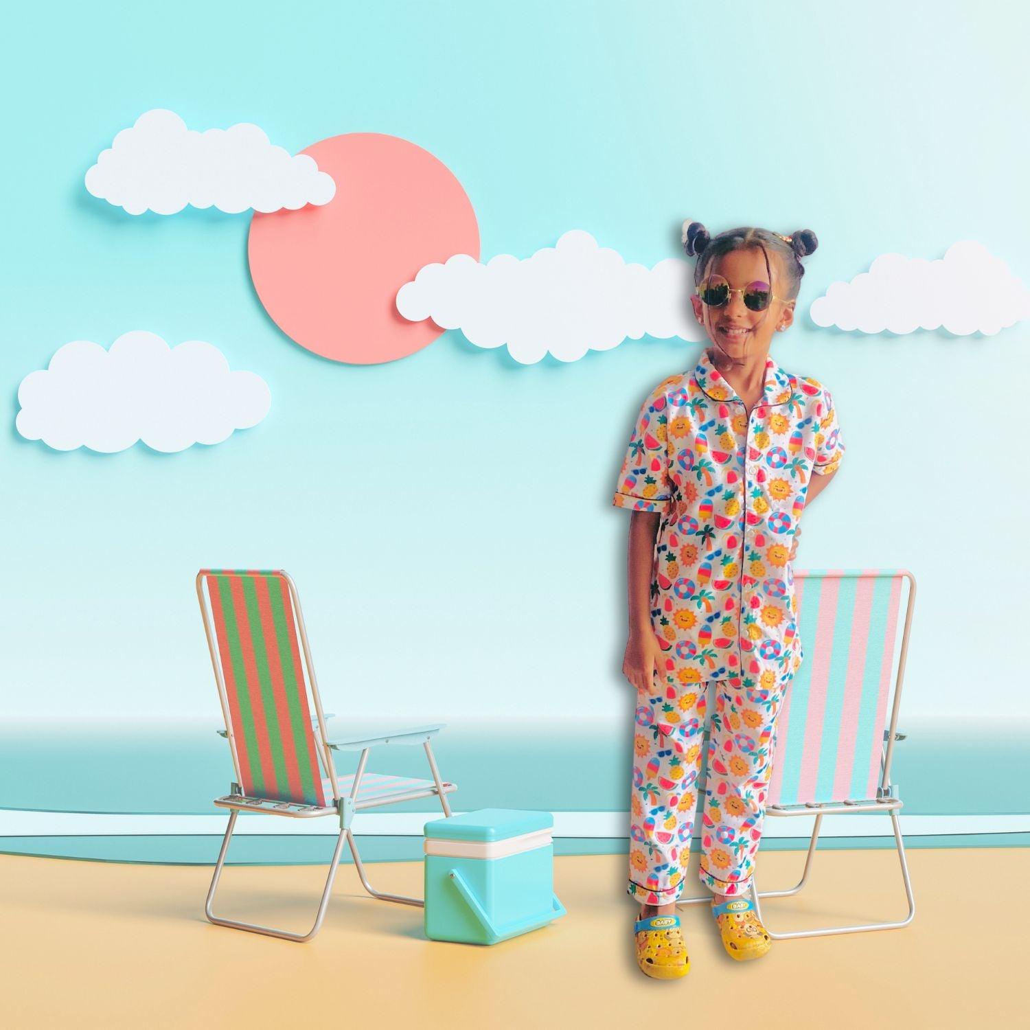 Sunny Beach Doodle Pajama Set by RedBerry Cuddle, made from 100% cotton. A soft and cheerful unisex pajama set for kids, featuring fun beach-themed doodles, perfect for comfortable and playful sleep.