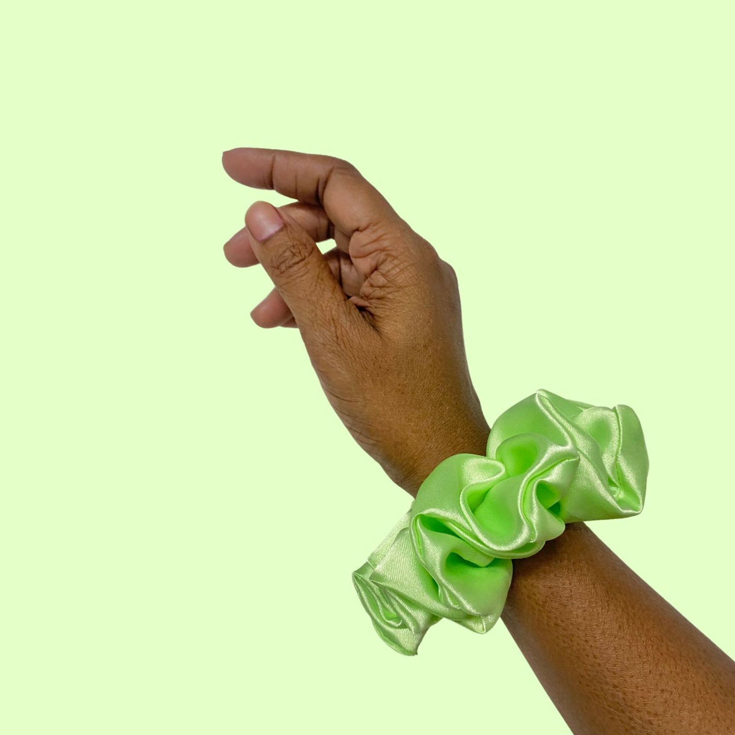 Lime Green Scrunchie in medium size by RedBerry Cuddle. A bright, refreshing green hair accessory with a soft, plush texture, offering a secure and comfortable hold.