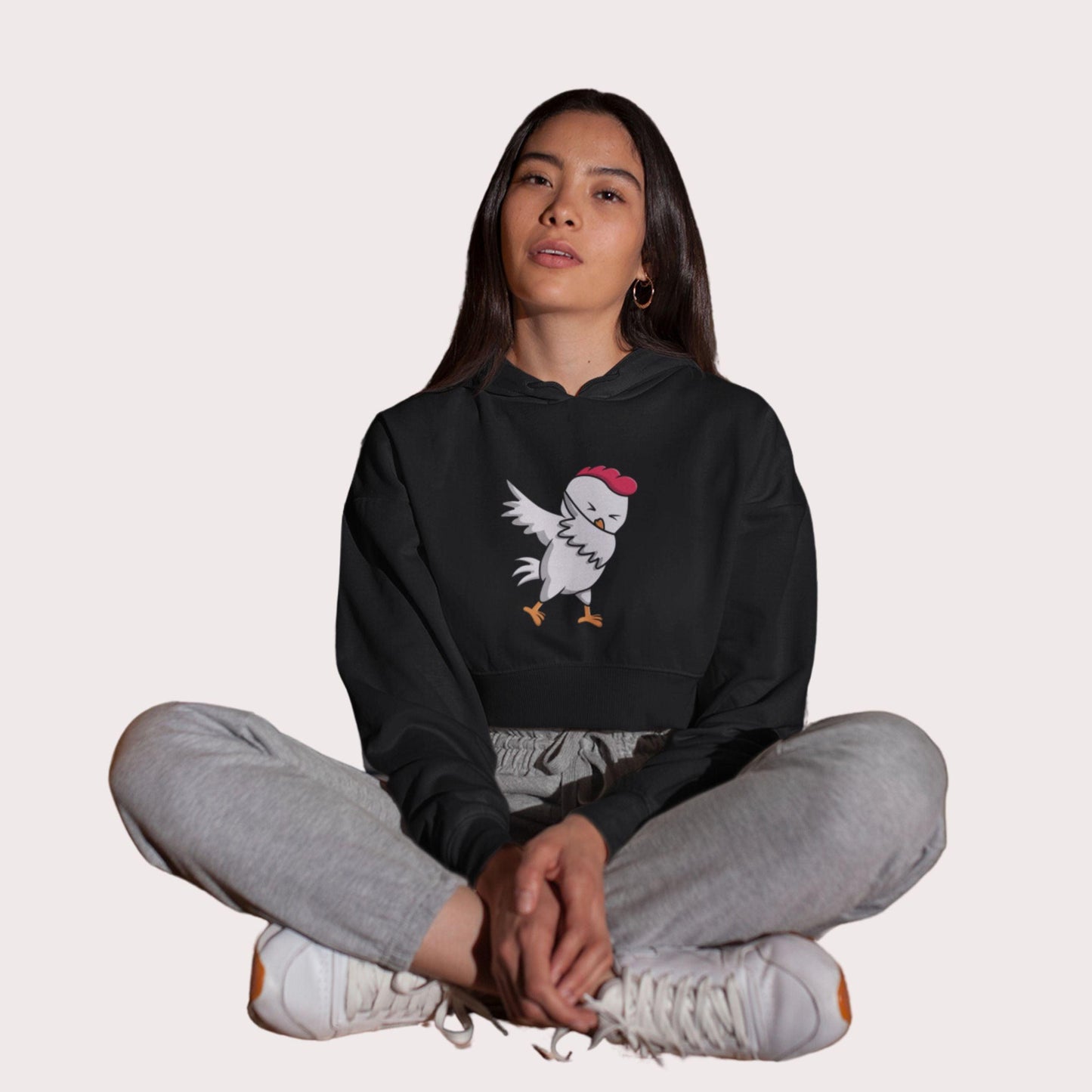 Yo Chicken Women's Crop Hoodie by RedBerry Cuddle, featuring a playful chicken-themed design. This hoodie offers a fun and trendy style, perfect for casual wear.