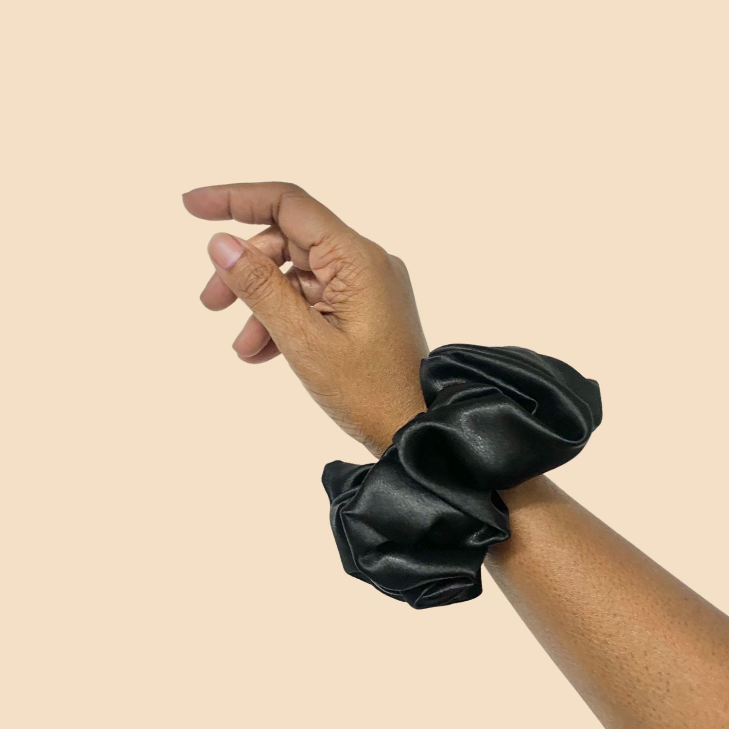 Black Large Size Scrunchie by RedBerry Cuddle, a stylish and durable hair accessory designed for a secure hold, ideal for thick hair and various hairstyles.