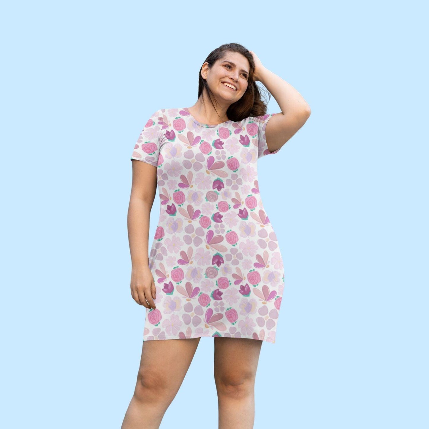 Floral Women's T-shirt Dress by RedBerry Cuddle, featuring a vibrant floral design. It is fade-proof and includes two attached pockets for both style and practicality.