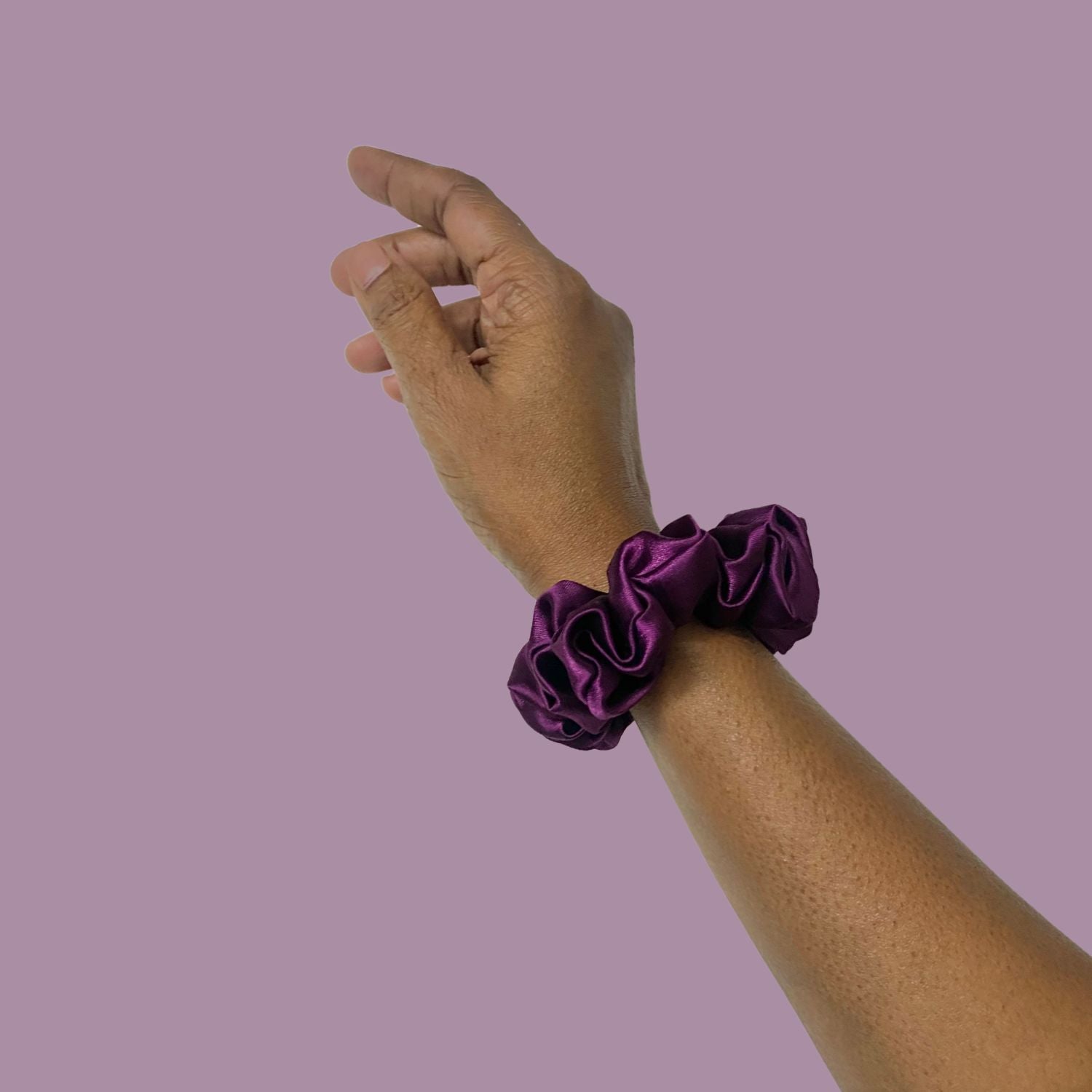 Grape Purple Scrunchie in small size by RedBerry Cuddle. A rich, deep purple hair accessory with a soft, plush texture, designed for a secure and stylish hold.