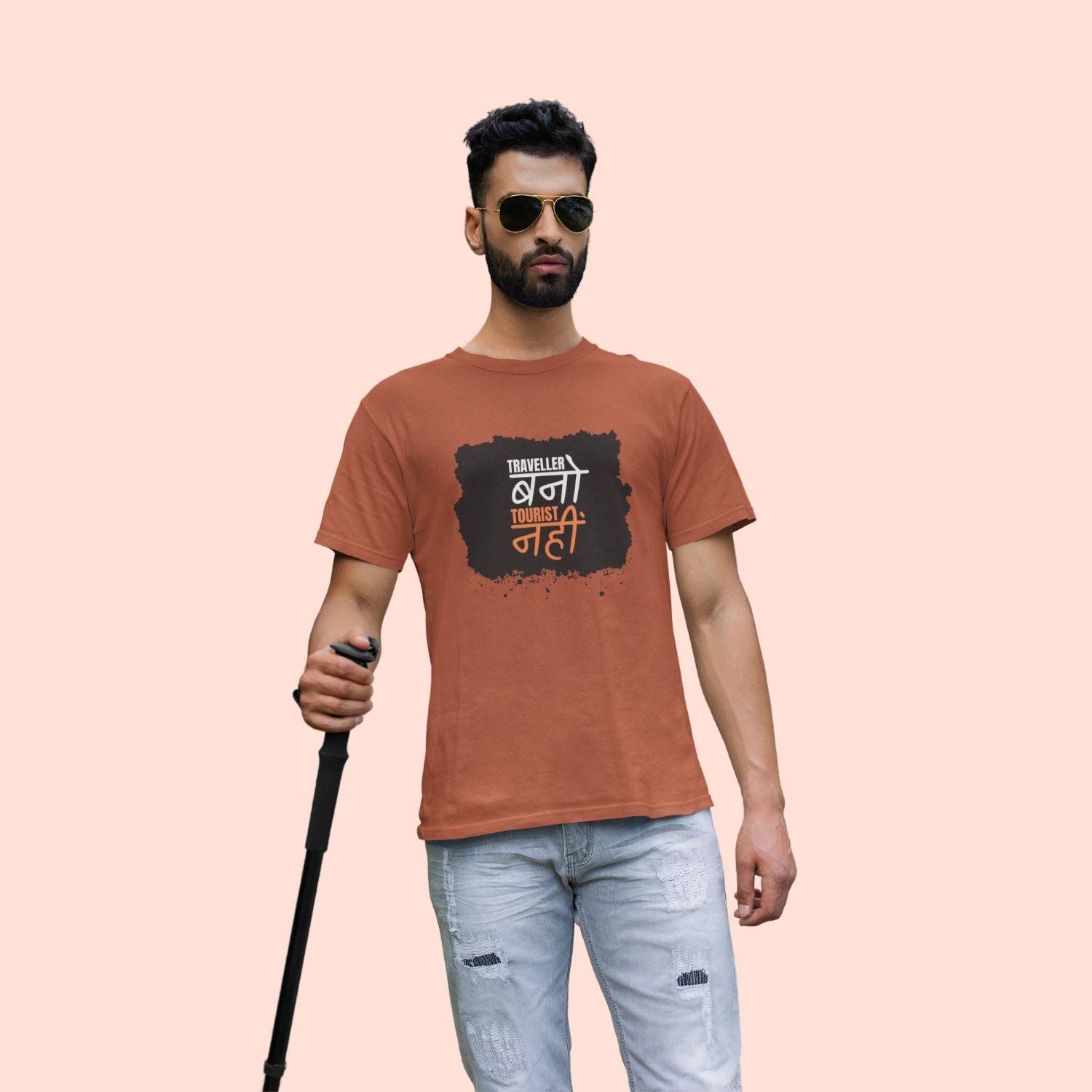 Traveller Bano Tourist Nahi Men's T-shirt by RedBerry Cuddle, made from 100% cotton. It features a bold travel-themed slogan, offering comfort with an adventurous spirit."