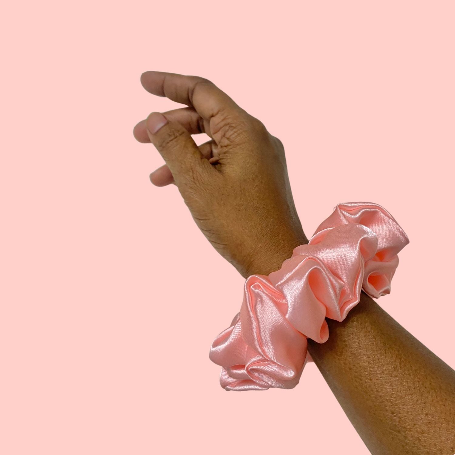 Flamingo Pink Scrunchie in medium size by RedBerry Cuddle. A vibrant pink hair accessory with a soft, plush texture, offering a secure and comfortable hold.