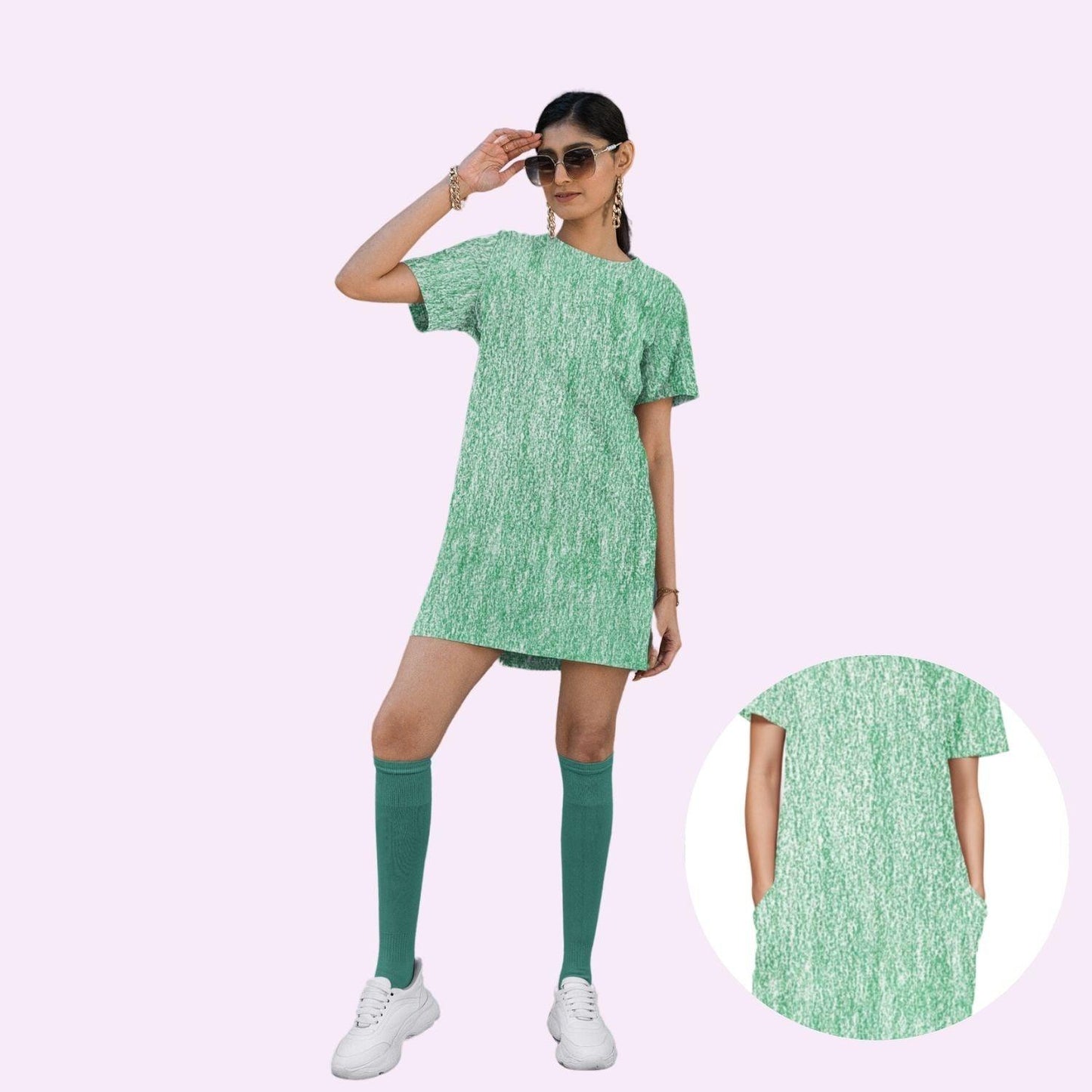 Green Crayon Women's T-shirt Dress by RedBerry Cuddle, featuring a fun crayon-inspired design. It is fade-proof and comes with two attached pockets for added convenience and style.