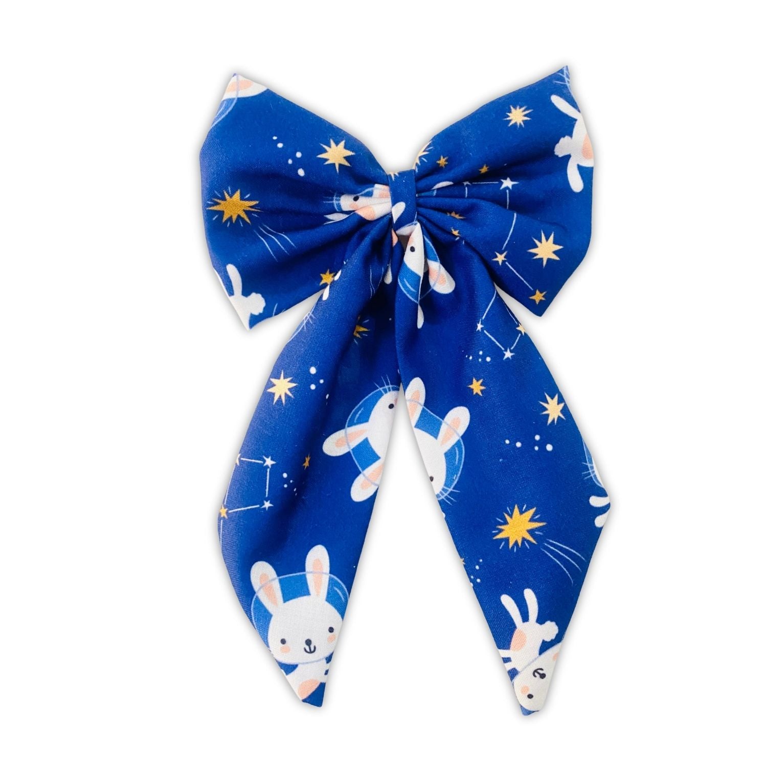 Bunny Space Midi Tail Hair Bow by RedBerry Cuddle. A whimsical and adorable hair accessory featuring a midi-length bow with a playful bunny and space-themed design, crafted from high-quality fabric for a secure and charming look.