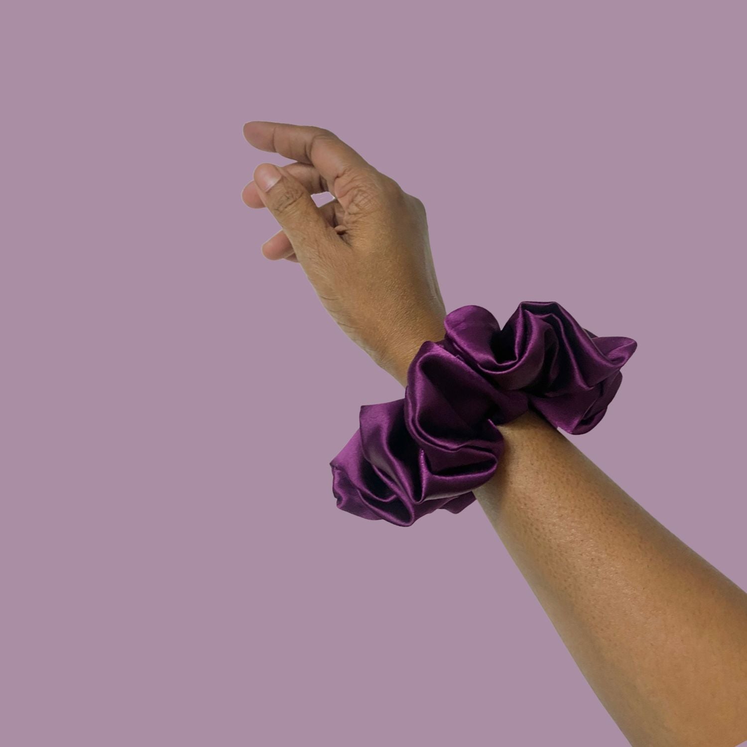 Grape Purple Scrunchie in large size by RedBerry Cuddle. A rich, deep purple hair accessory with a soft, plush texture, designed for a secure and stylish hold.
