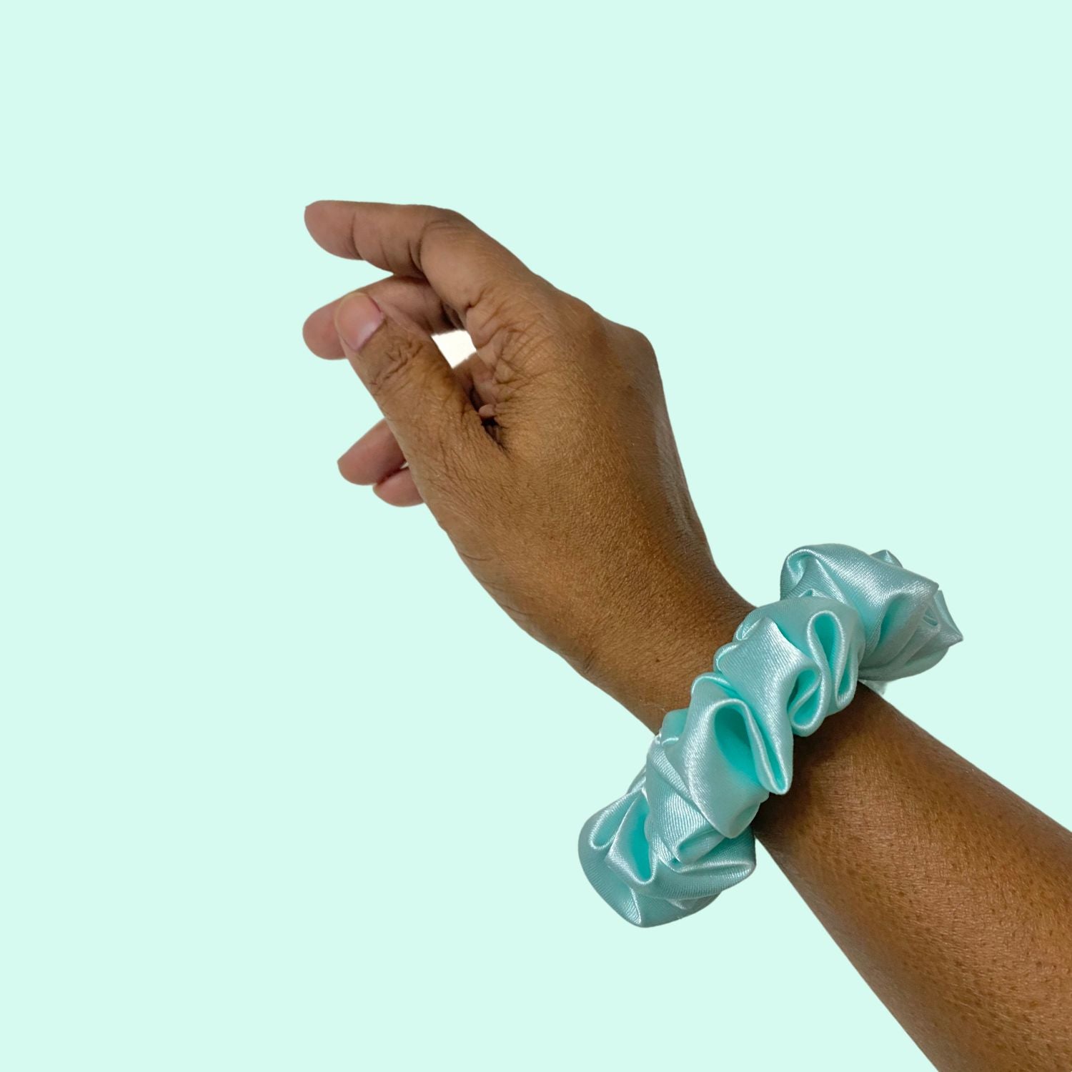 Ocean Blue Scrunchie (Small Size) by RedBerry Cuddle, a vibrant and durable hair accessory, perfect for adding a pop of color to any hairstyle.