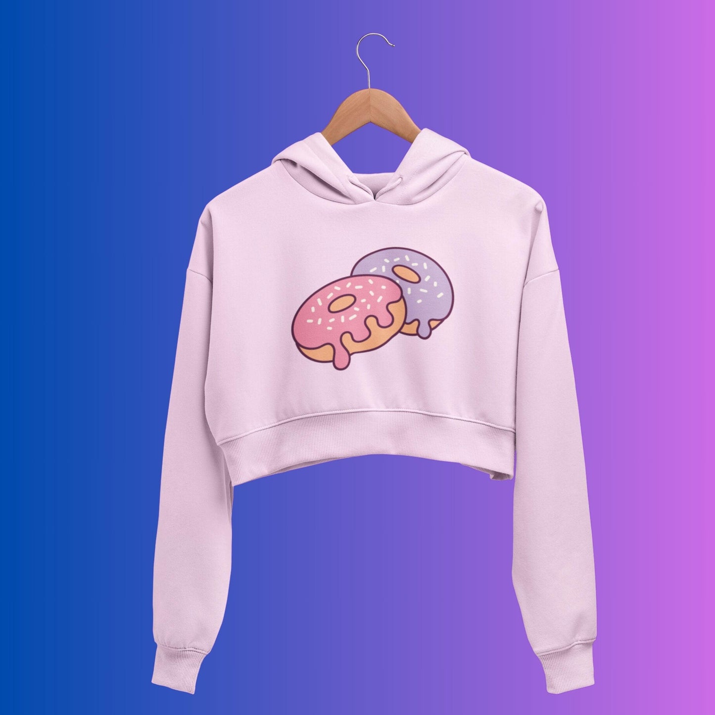 Donuts Women's Crop Hoodie by RedBerry Cuddle, featuring a fun donut-themed design. This stylish hoodie combines comfort and playful charm, perfect for casual wear.