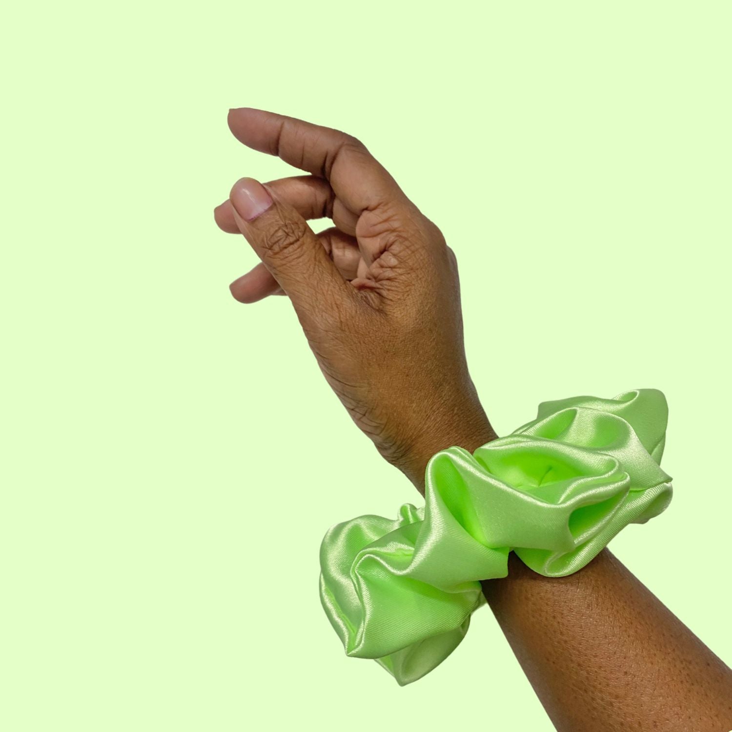 Lime Green Scrunchie in large size by RedBerry Cuddle. A bright, refreshing green hair accessory with a soft, plush texture, designed for a secure and stylish hold.