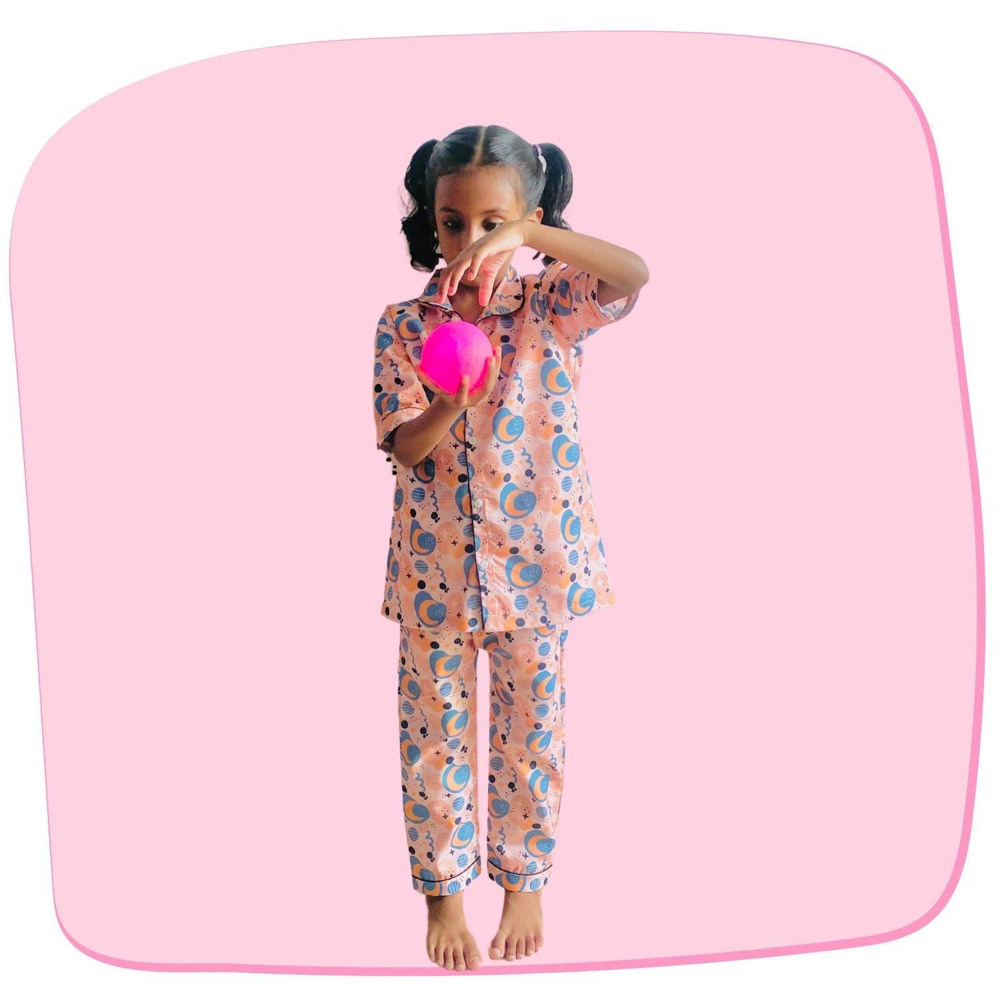 Moon Doodle Pajama Set by RedBerry Cuddle, made from 100% cotton. A soft and cozy unisex pajama set for kids, featuring playful moon doodle designs, perfect for a comfortable and restful night's sleep.