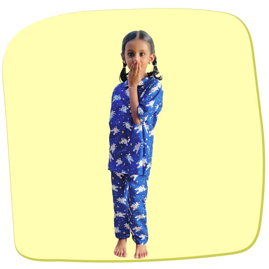 Bunny Space Pajama Set by RedBerry Cuddle, a unisex night suit for kids made from 100% cotton. The set showcases a fun space-themed design with bunnies, offering both comfort and charm for bedtime.