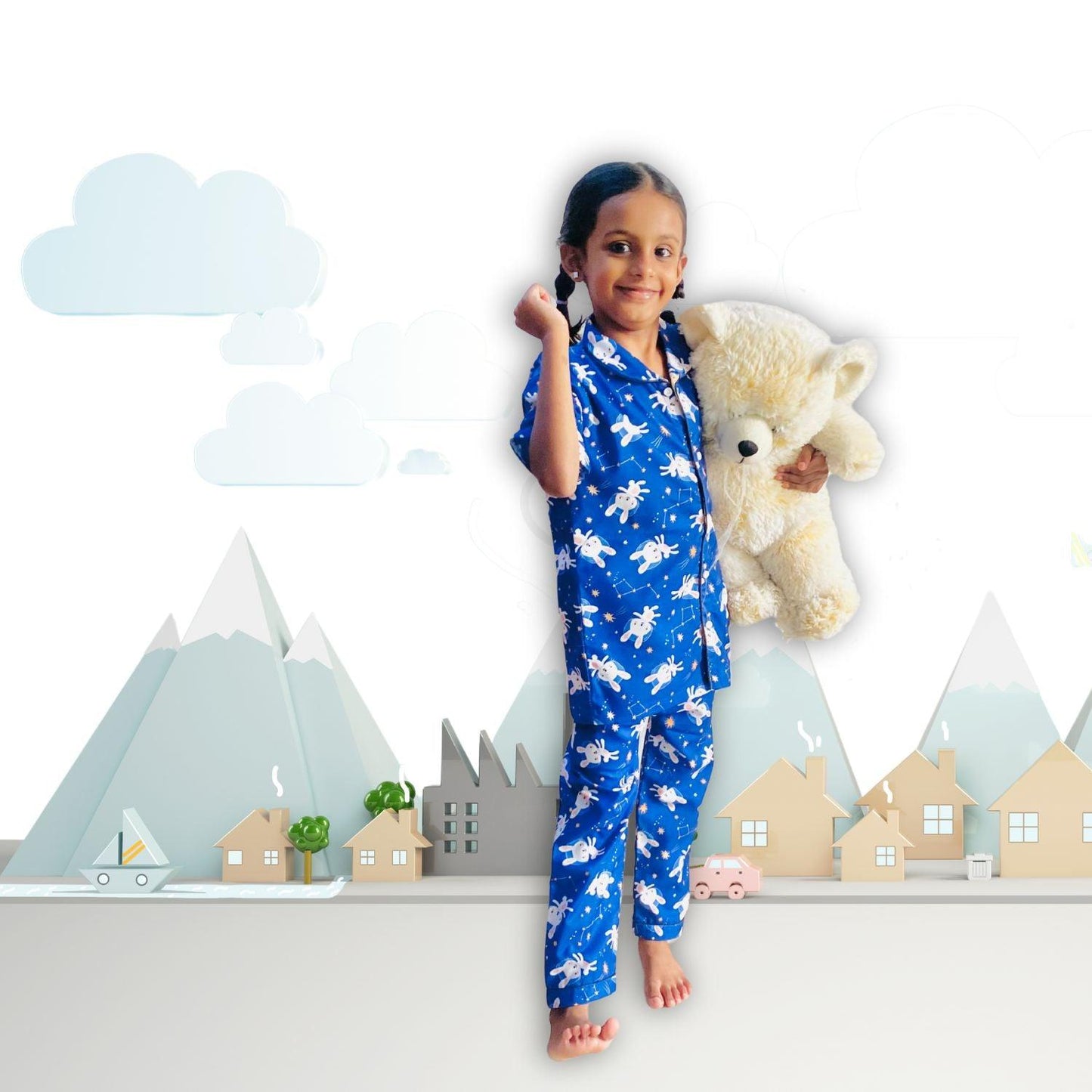 Bunny Space Pajama Set by RedBerry Cuddle, a unisex night suit for kids made from 100% cotton. The set showcases a fun space-themed design with bunnies, offering both comfort and charm for bedtime.