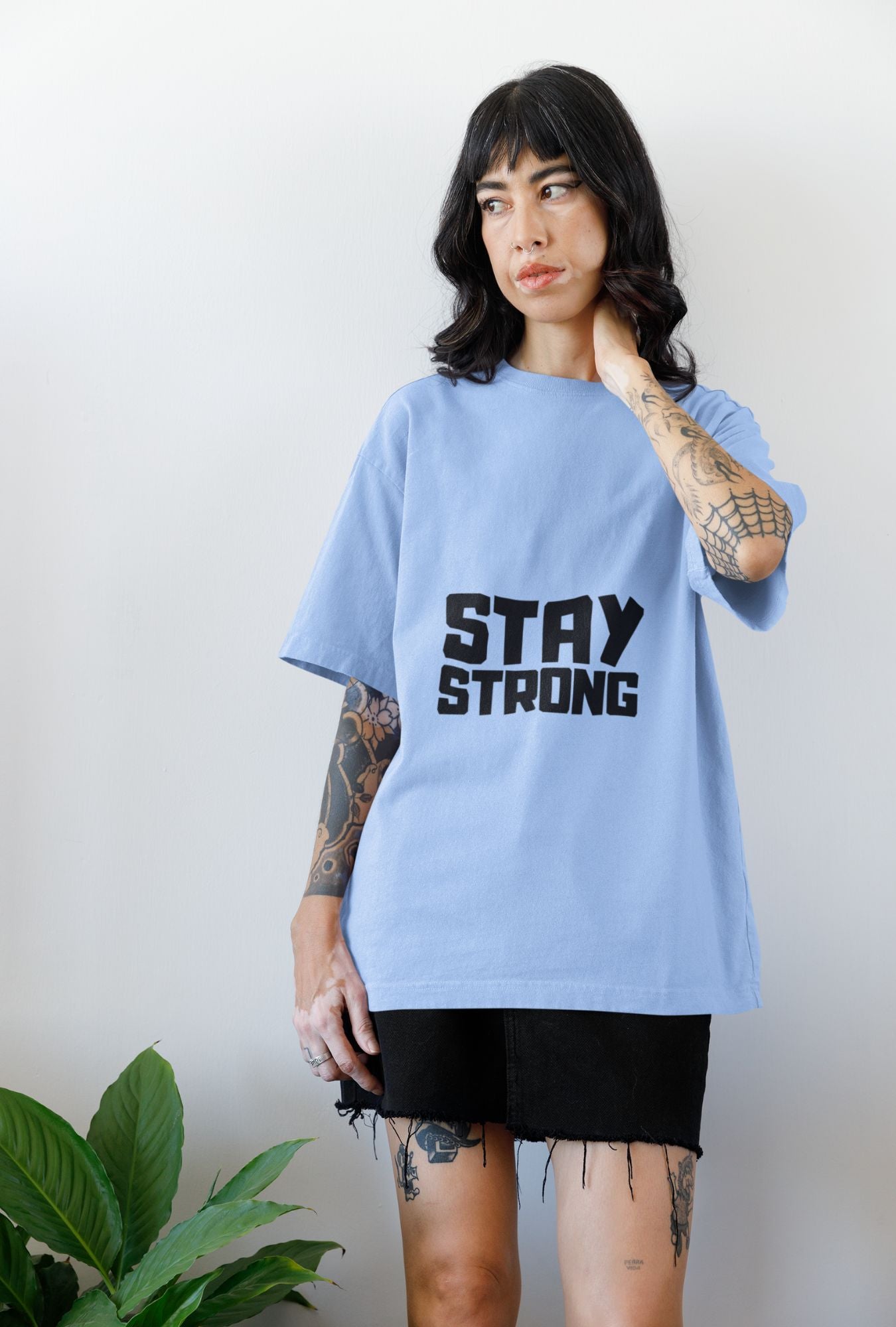 Stay Strong Women's Oversized T-shirt by RedBerry Cuddle, made from 100% cotton. This shirt features an empowering 'Stay Strong' message, offering a comfortable, relaxed fit for casual wear.