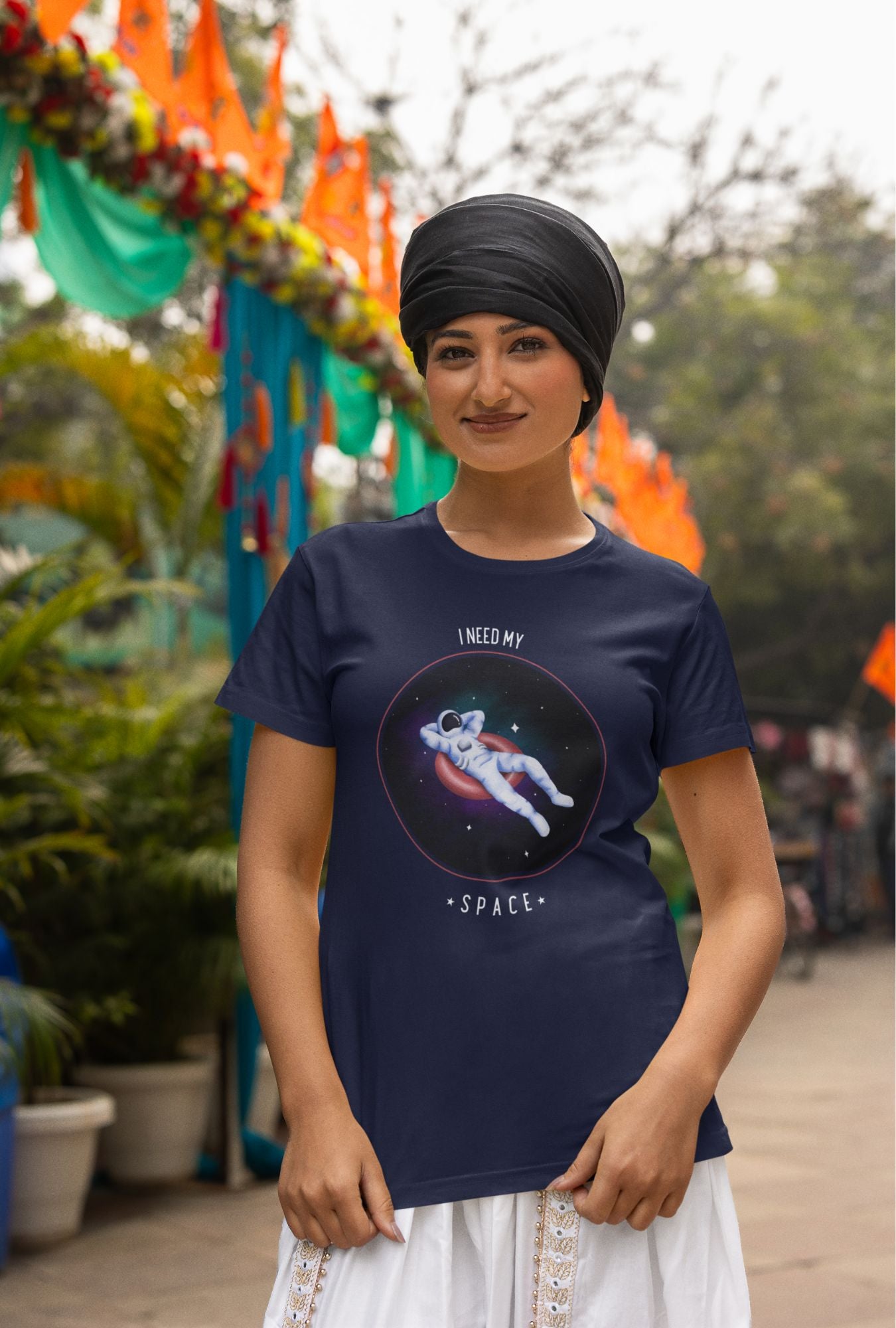 I Need My Space Women's T-shirt by RedBerry Cuddle, made from 100% cotton. It features a playful space-themed slogan, combining comfort with a fun, expressive design.