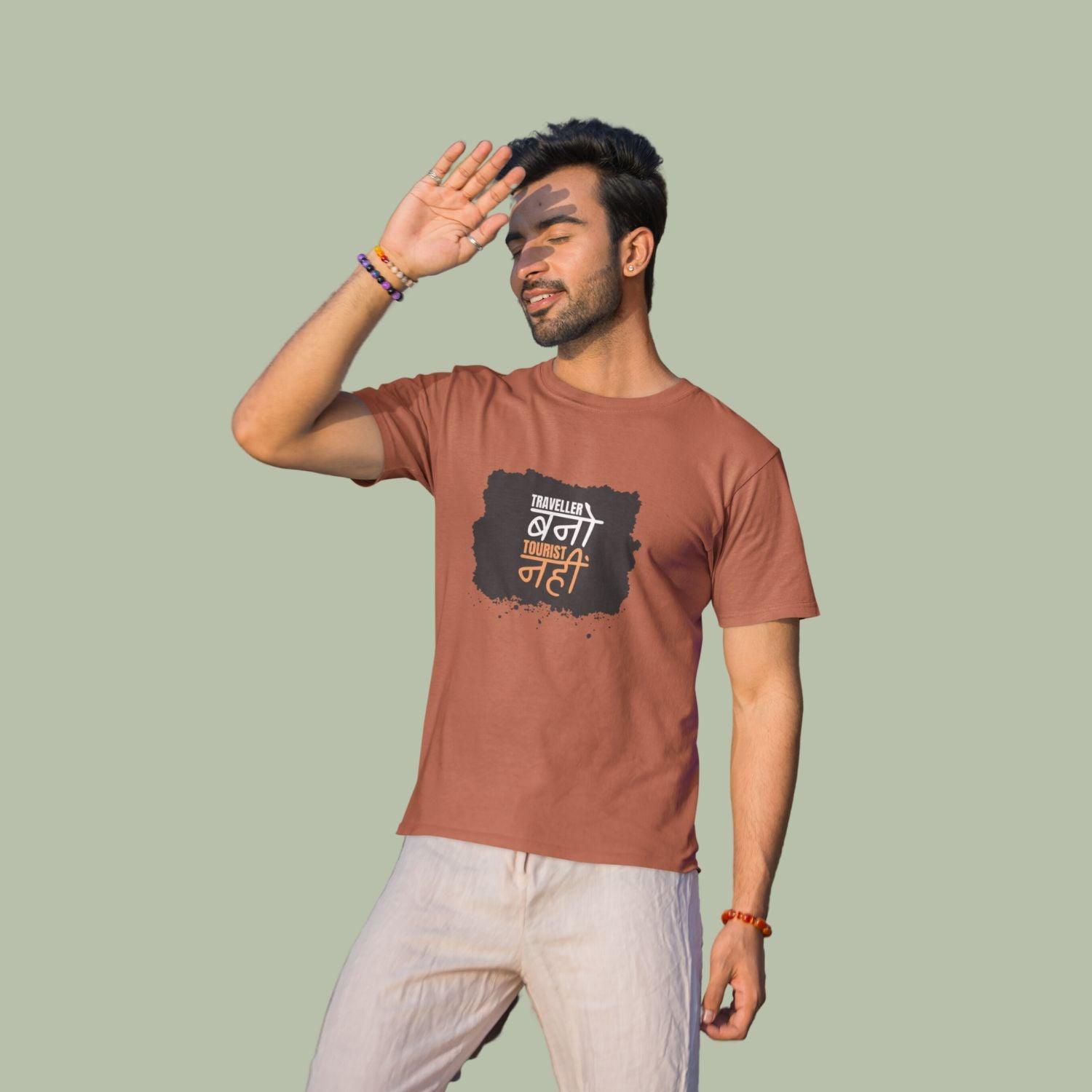 Traveller Bano Tourist Nahi Men's T-shirt by RedBerry Cuddle, made from 100% cotton. It features a bold travel-themed slogan, offering comfort with an adventurous spirit."