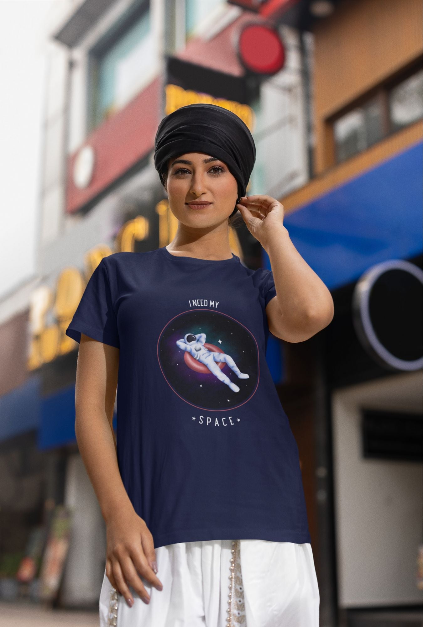 I Need My Space Women's T-shirt by RedBerry Cuddle, made from 100% cotton. It features a playful space-themed slogan, combining comfort with a fun, expressive design.