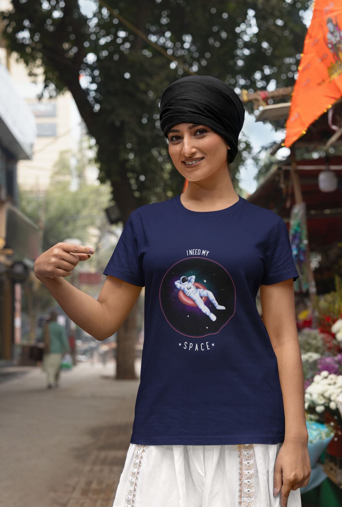 I Need My Space Women's T-shirt by RedBerry Cuddle, made from 100% cotton. It features a playful space-themed slogan, combining comfort with a fun, expressive design.