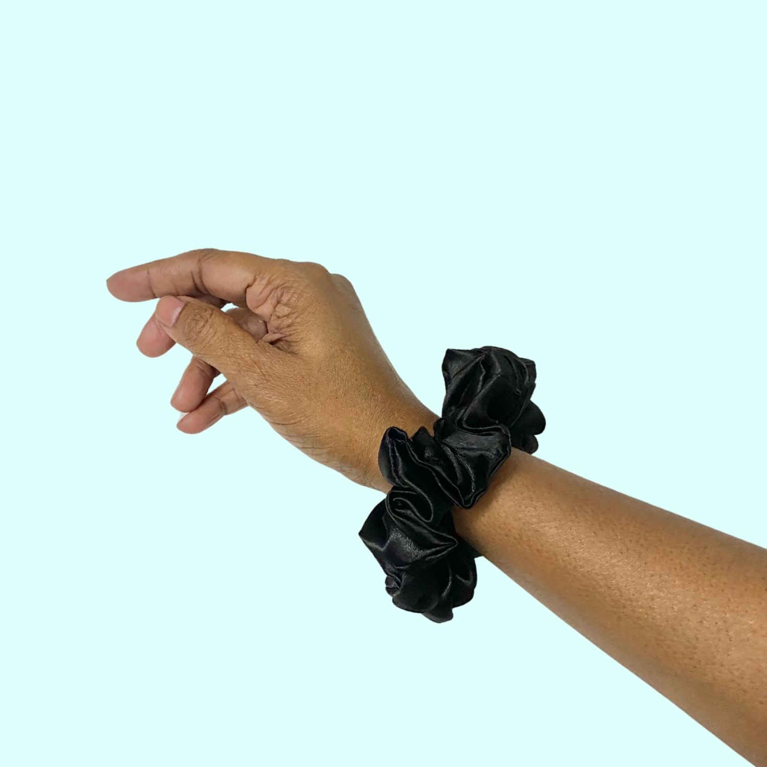 Black Small Size Scrunchie by RedBerry Cuddle, a sleek and versatile hair accessory made for a comfortable and secure fit, perfect for everyday and special occasions.