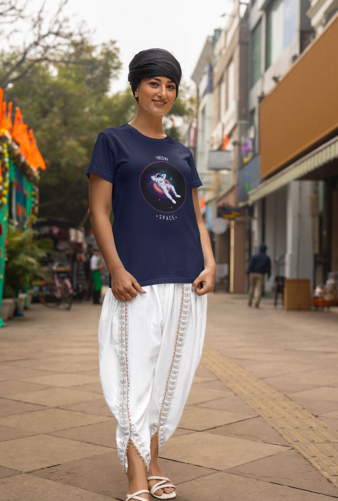 I Need My Space Women's T-shirt by RedBerry Cuddle, made from 100% cotton. It features a playful space-themed slogan, combining comfort with a fun, expressive design.