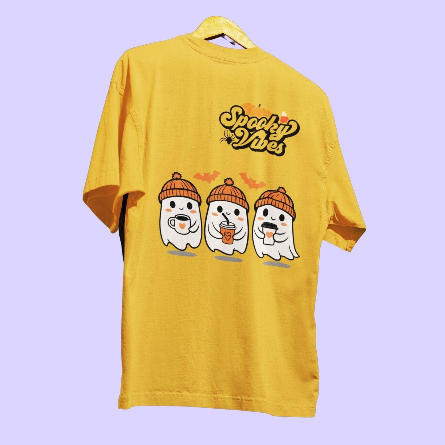 Halloween Spooky Vibes Women's Oversized T-shirt by RedBerry Cuddle, made from 100% cotton. This shirt features a fun 'Spooky Vibes' Halloween-themed design, offering a comfortable and relaxed fit for casual wear.